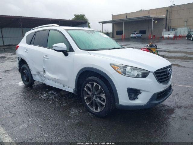  Salvage Mazda Cx