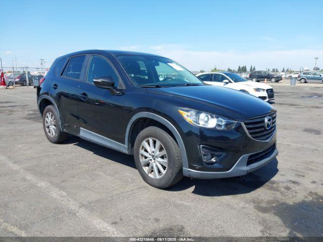  Salvage Mazda Cx
