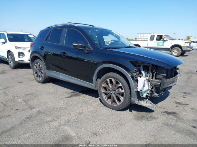  Salvage Mazda Cx