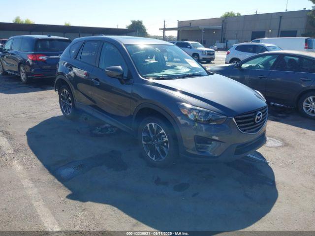 Salvage Mazda Cx
