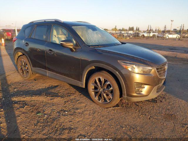  Salvage Mazda Cx
